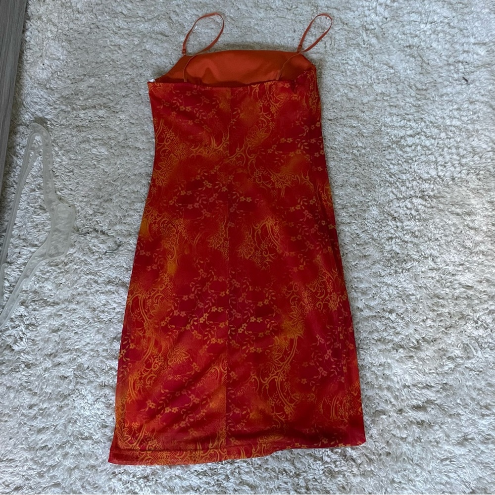 City triangles red orange body sculpting dress.